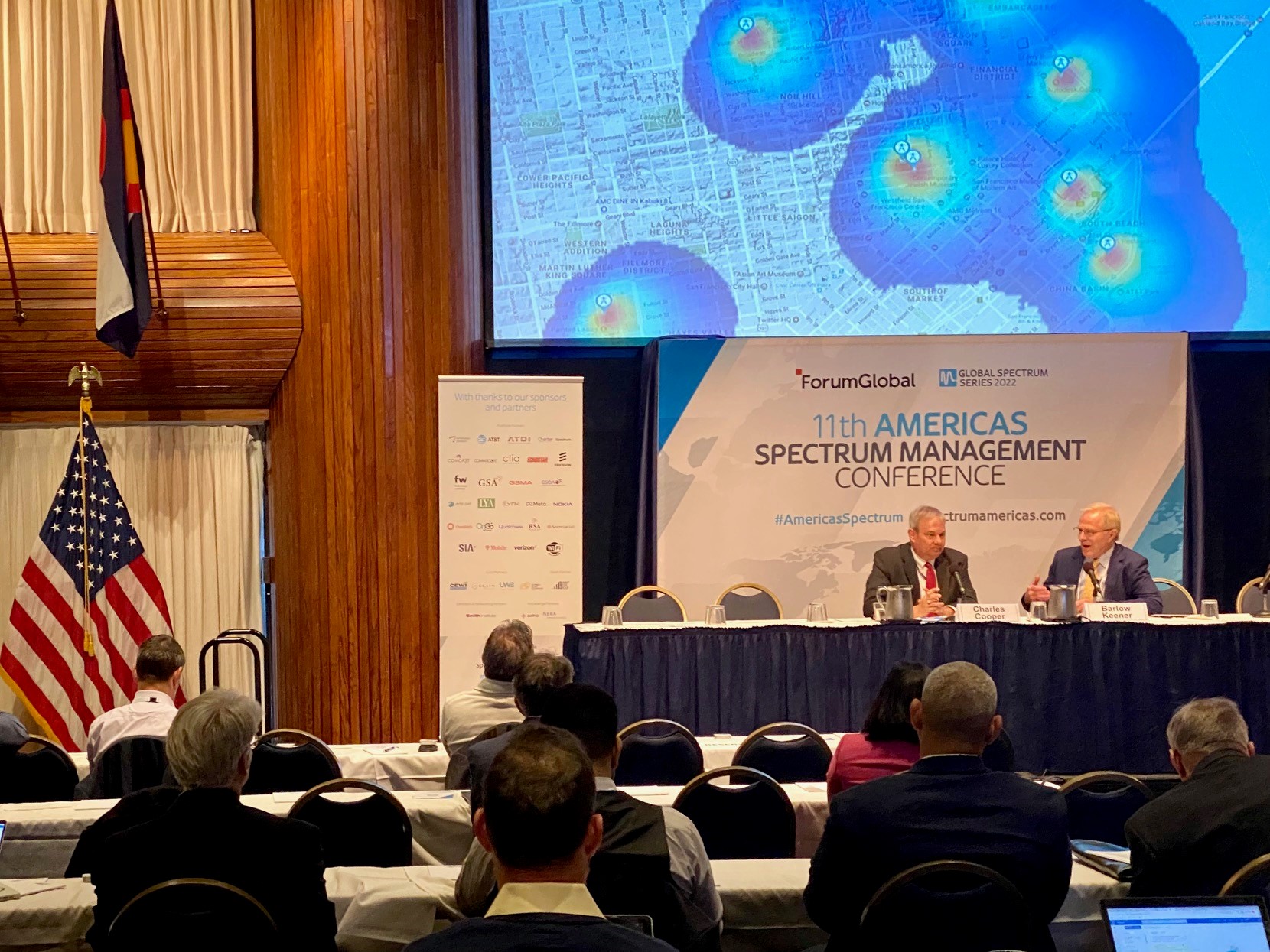 A zoomed-out image of the audience listening to a panel discussion on “Avoiding Harmful Interference: Are Current Interference Standards and Protection Sufficient in the 5G Era?"