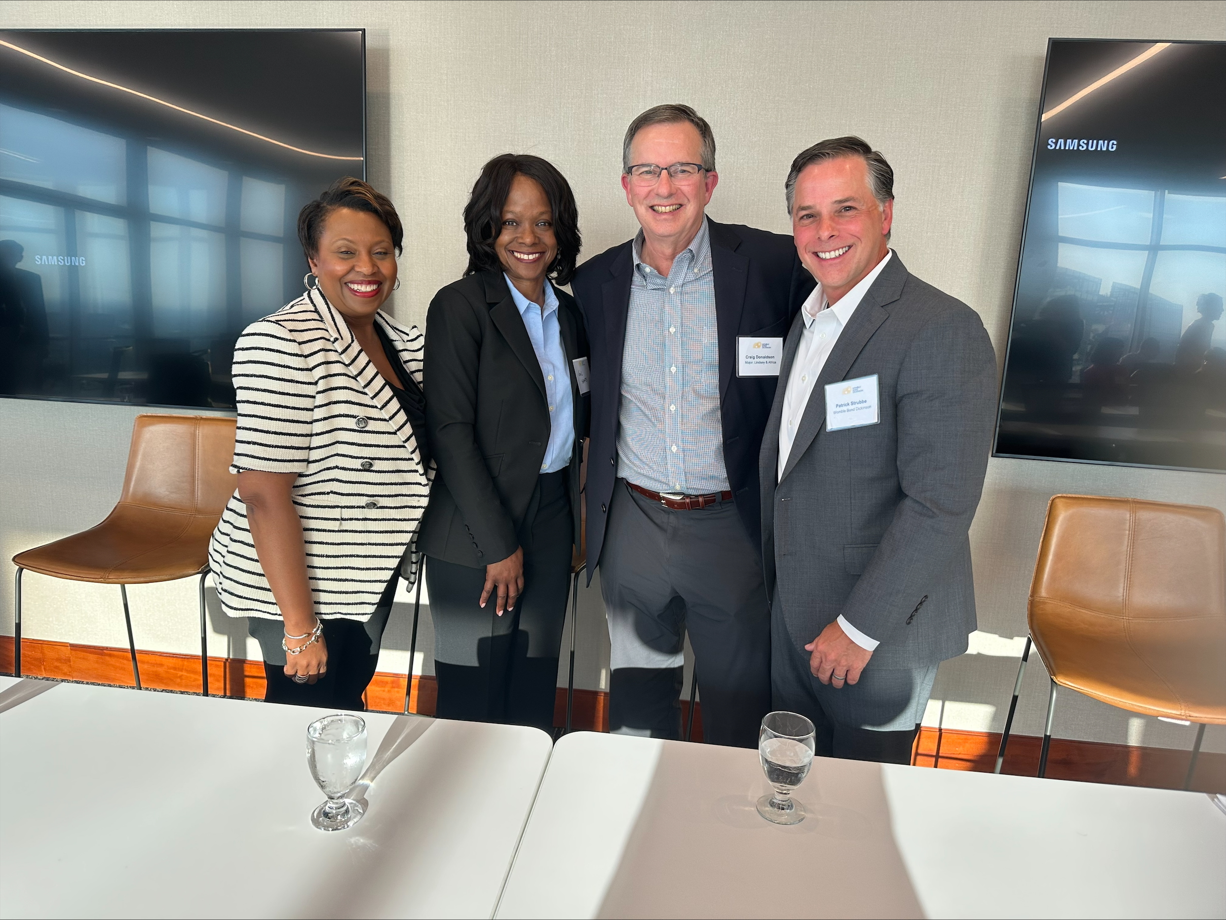 Panelists Craig Gail Sharps, Lynne Fuller-Andrews, Craig Donaldson, and Patrick Strubbe