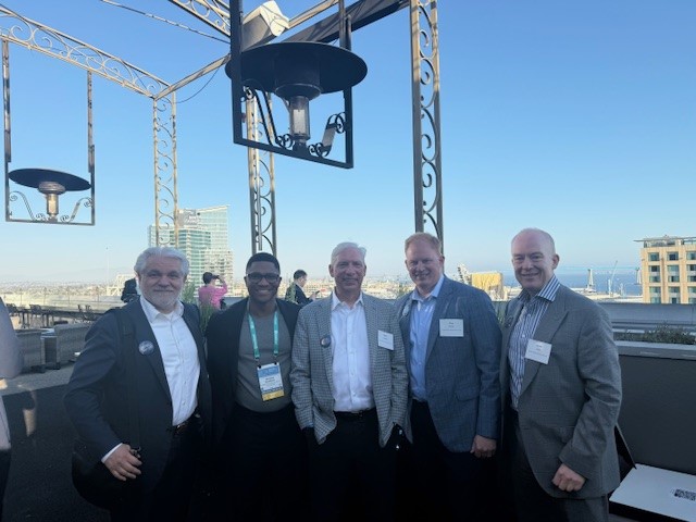 Nick Hawkins, Steve Levitan, Cory Schug, and James Love on a rooftop in San Diego.