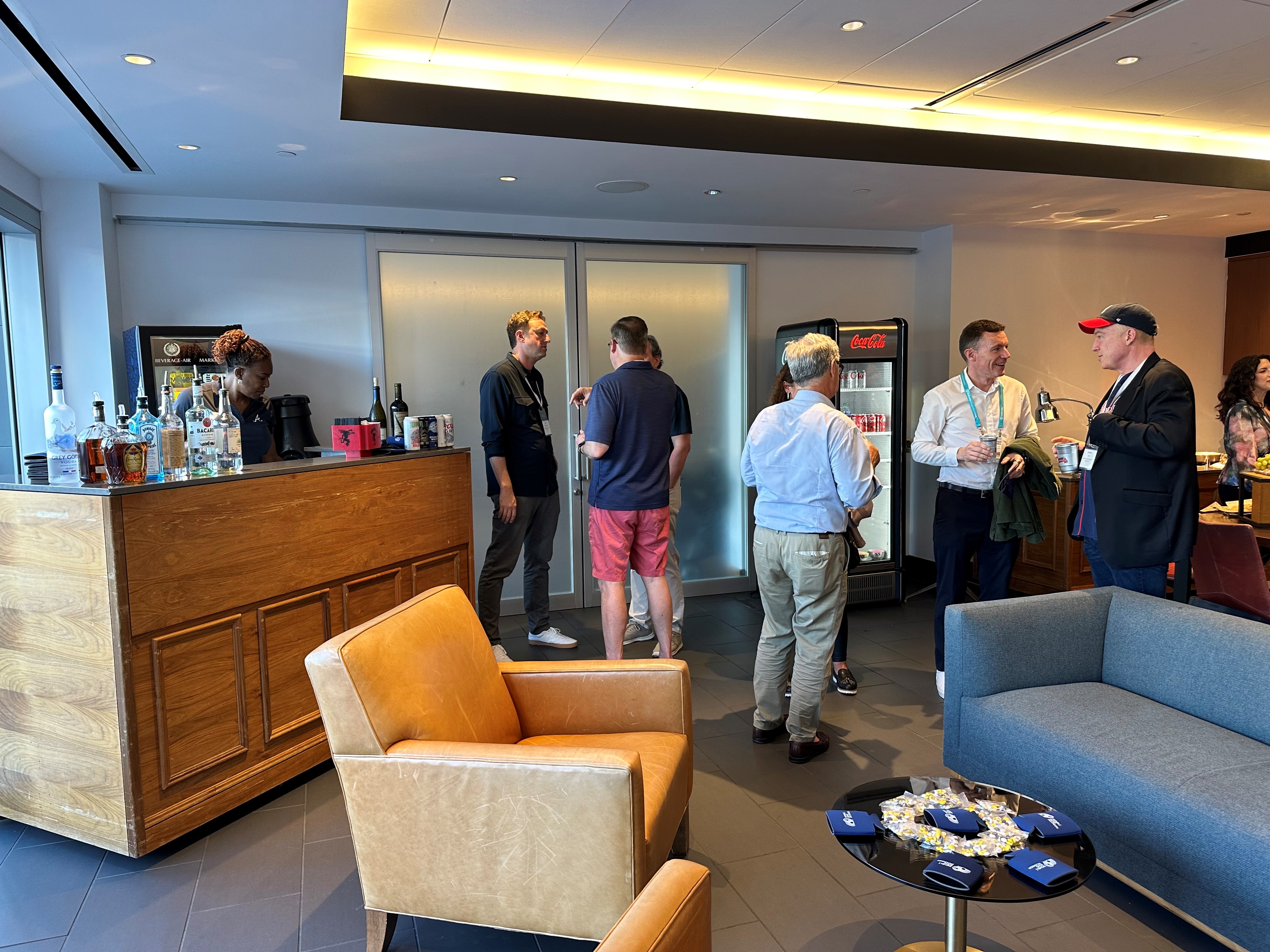 Guests mingle inside the suite at Truist Park.