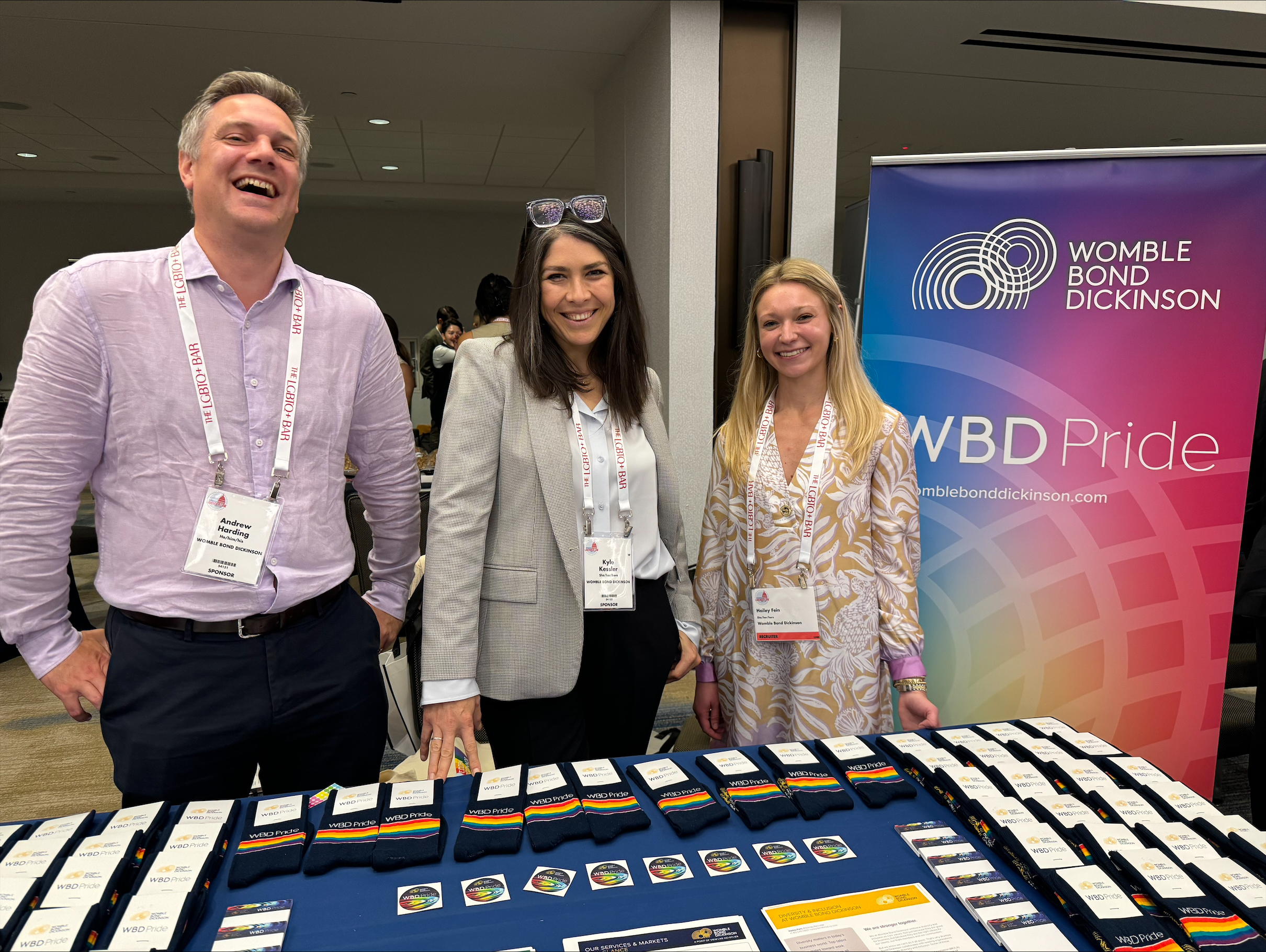 Andrew Harding, Kyle Kessler and Heiley Fein at the WBD Pride display