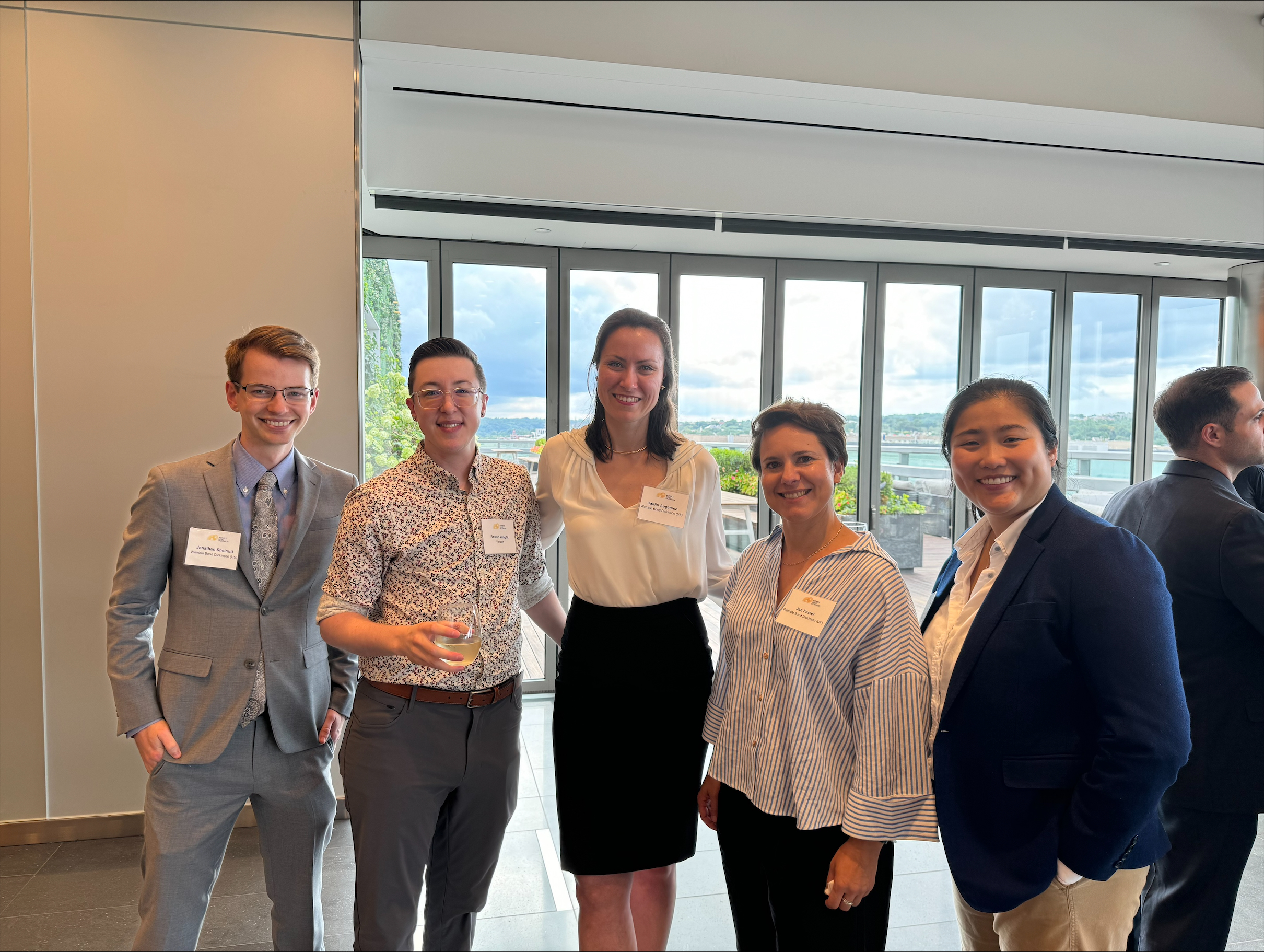 Womble's reception attendees included Caitlin Augerson, Jan Foster, and Christine Xiao.