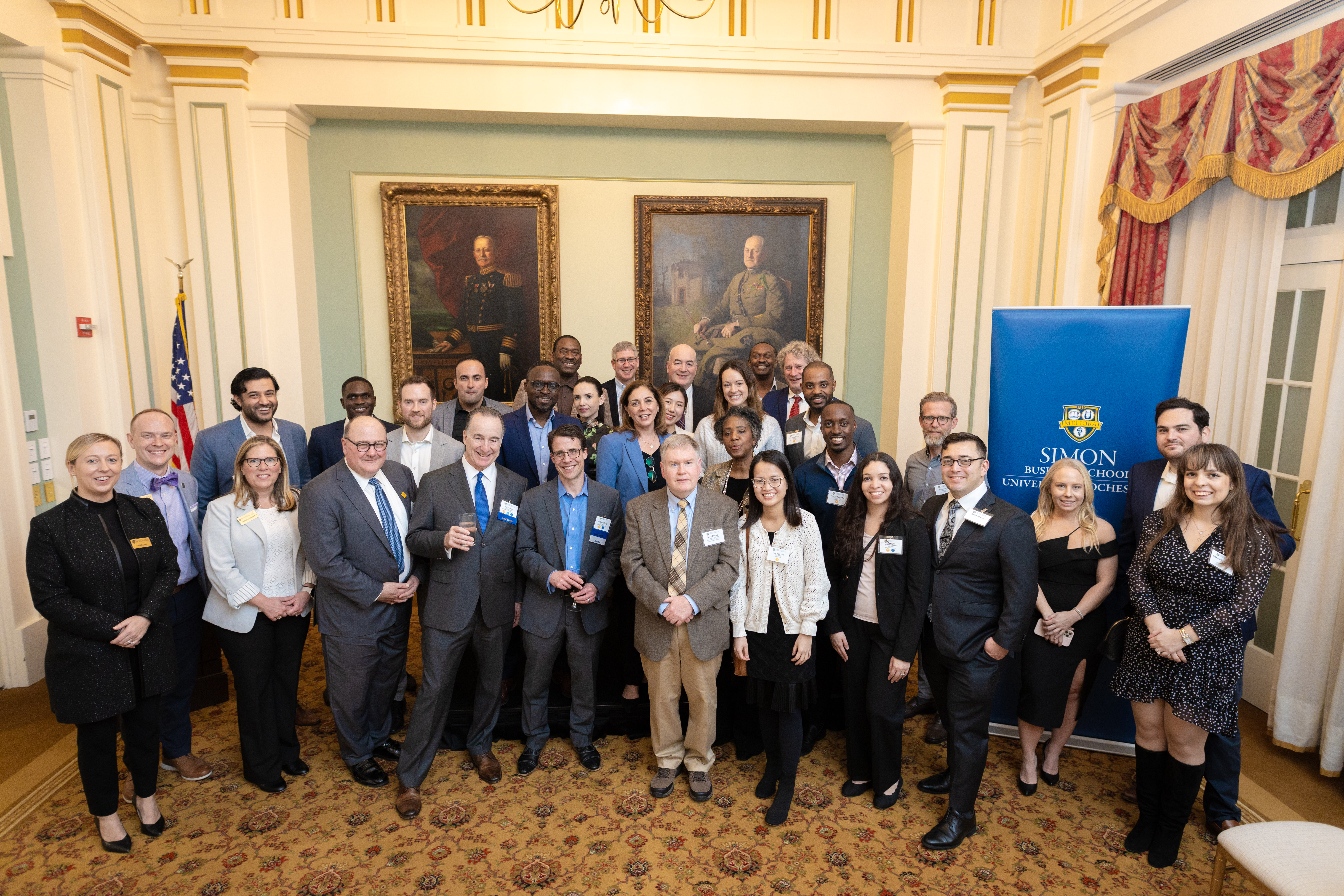 Attending alumni gather for a group photo