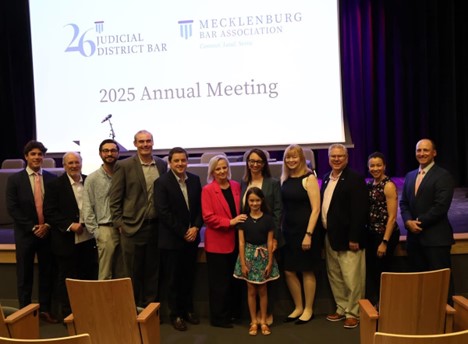 Sarah Motley Stone and members of Womble Bond Dickinson's Charlotte office celebrate.