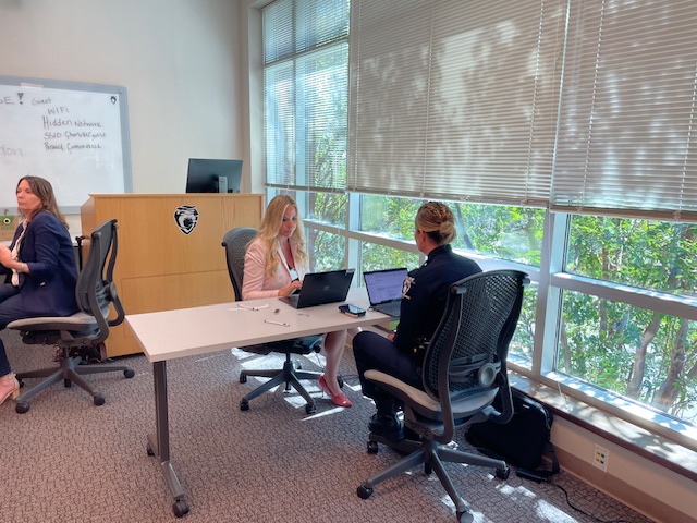 Attorney Rachel Keen provides legal services to a Charlotte-Mecklenburg police officer.