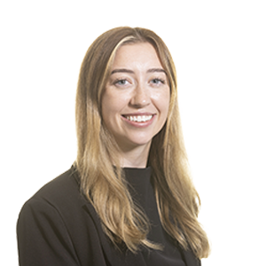 Woman with long light brown hair with a black top