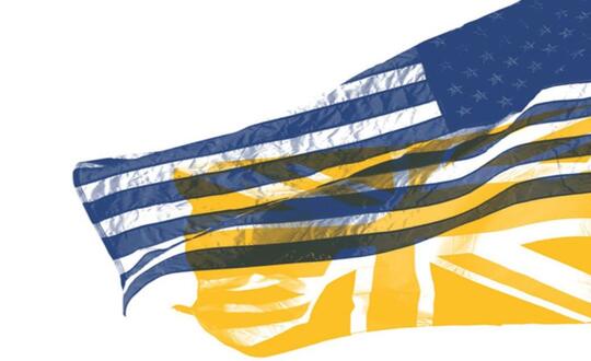 American flag flying over UK flag