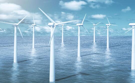 Windmills in the water with sky background - Shutterstock 329161412