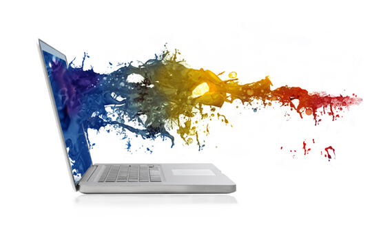Paint splashes out of a laptop screen