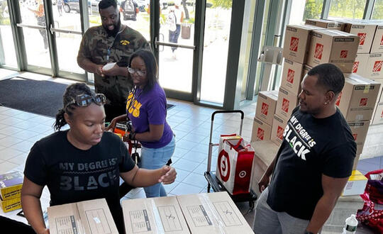 Care packages sponsored by Womble's HBCU Succeed Program are delivered in Texas.