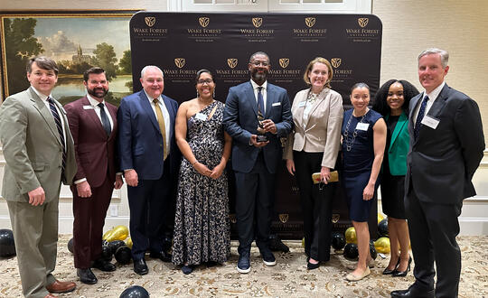 A team from Womble Bond Dickinson celebrates the new James “Jimmy” Quander Moot Court Team at the ceremony.