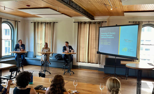 Logan Buck, Paige Fang, and Evan Fultz present on global IP protection.