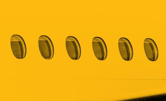 Row of windows on side of aeroplane