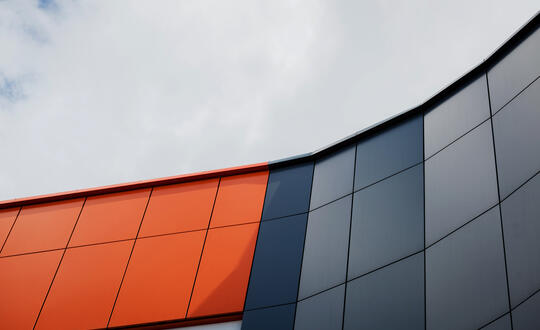 Orange and grey cladding