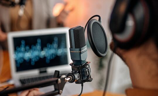 Man recording podcast