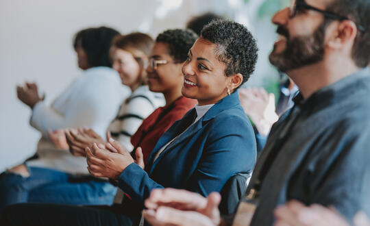 Group of people clapping