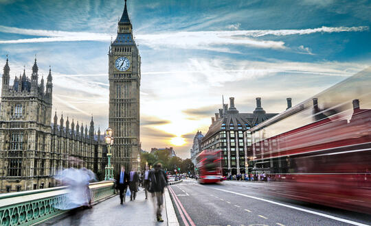 Big Ben and Houses of Parliament in rush hour