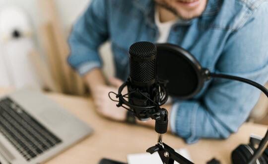 Man recording podcast