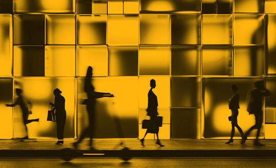 People walking in front of office buildings