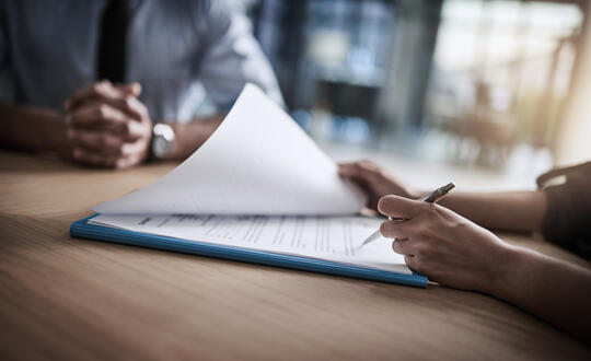 Person signing contract