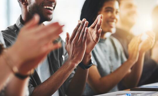 Group of people clapping