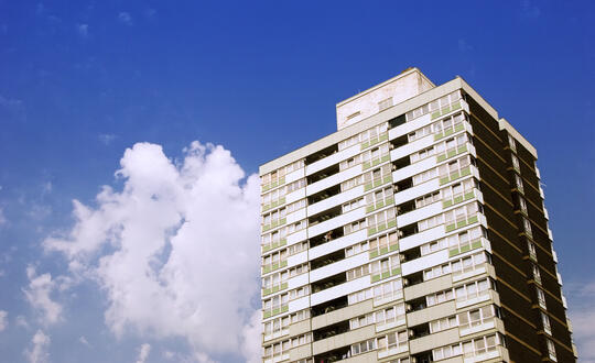 High rise flats with clouds