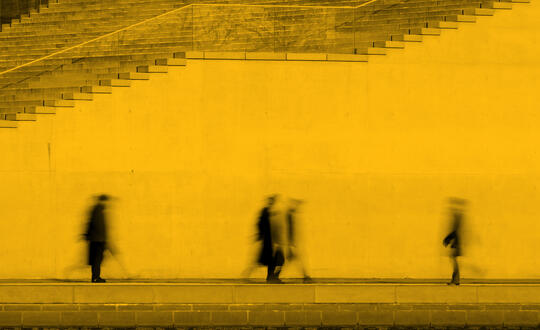 Shadows of people walking