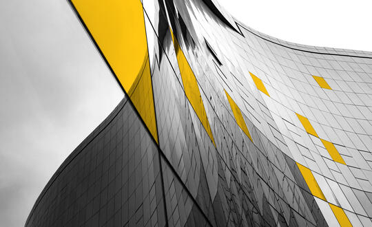 Reflection on side of a glass building