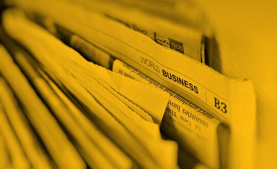 Close up of pile of newspapers