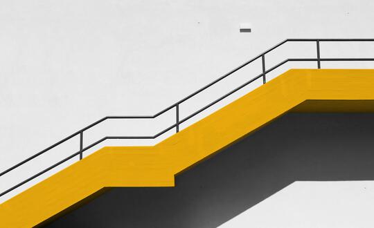 Shot of climbing stairs with yellow highlight
