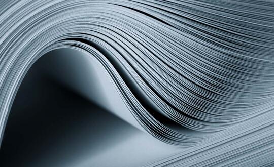 Curved pages of a document.