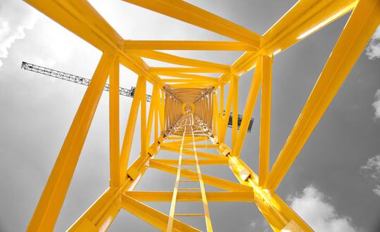 Upwards shot of construction/crane structure